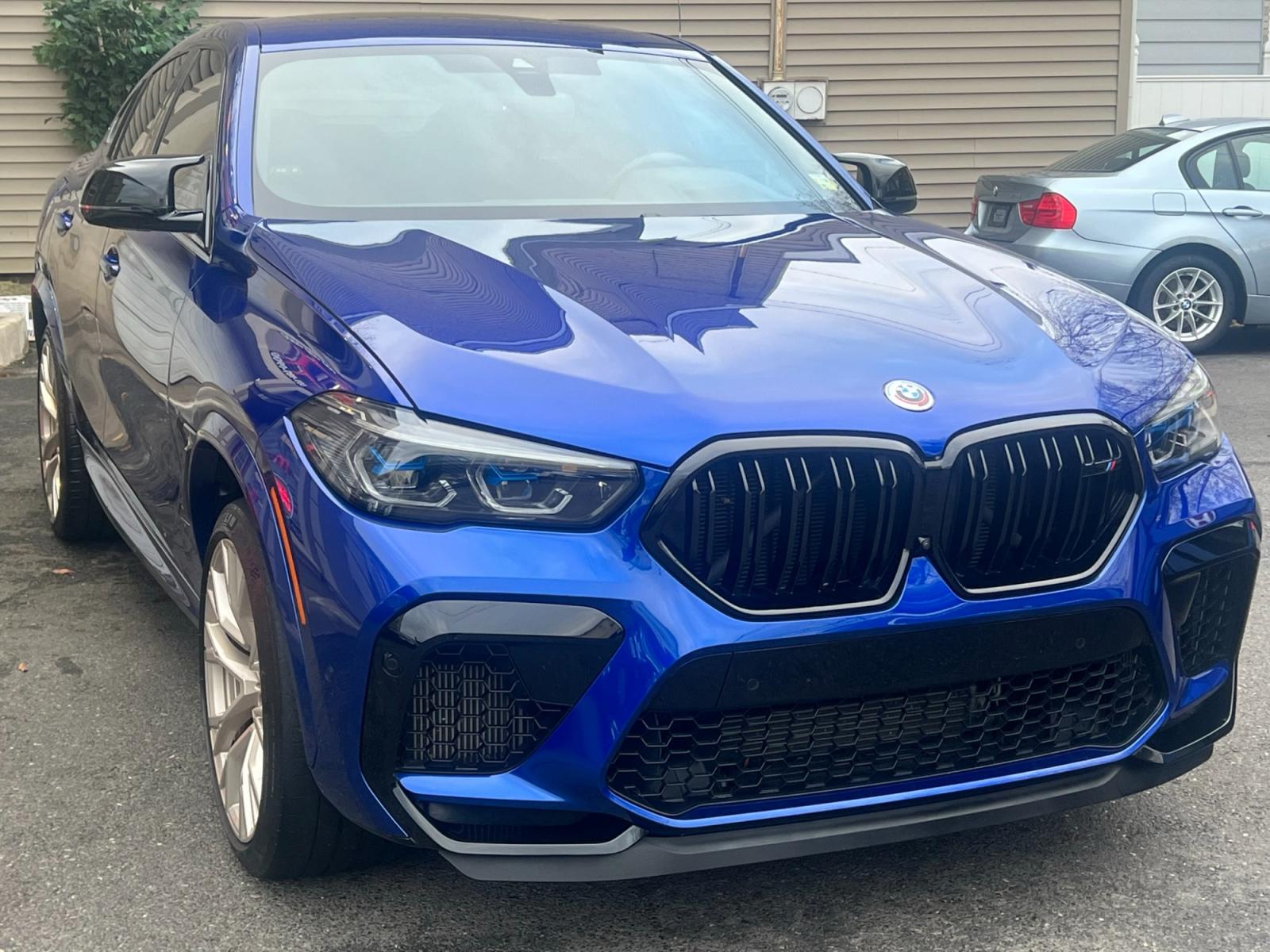 2022 Blue /Red/Black BMW X6 M Base (5YMCY0C07N9) with an 4.4L V8 DOHC 32V engine, 8A transmission, located at 1018 Brunswick Ave, Trenton, NJ, 08638, (609) 989-0900, 40.240086, -74.748085 - Holy Cow and Wow!!...That is the description on this absolutely stunning BMW X6 M Competition! Ordered by Anthony himself with the best color choice of Marina Bay Blue metallic and Red Interior to stand out on the road and to any enthusiast of the BMW X series! Executive Pkg. includes Remote Start, - Photo #25